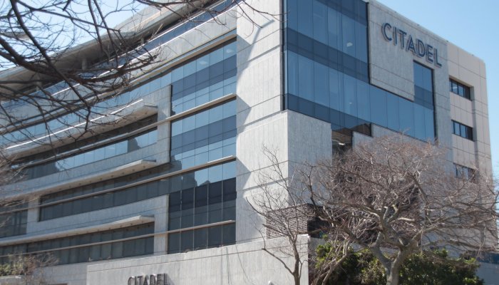 The street facades of The Citadel building are clad entirely in pale granite from Namibia, a durable stone with a modern look. 